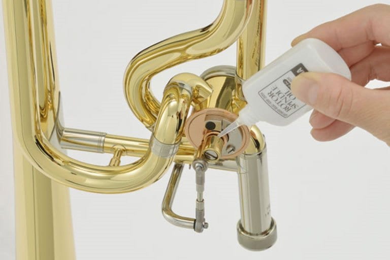 Close-up of Trombone with Rotary different valve where Rotor spindle oil can apply
