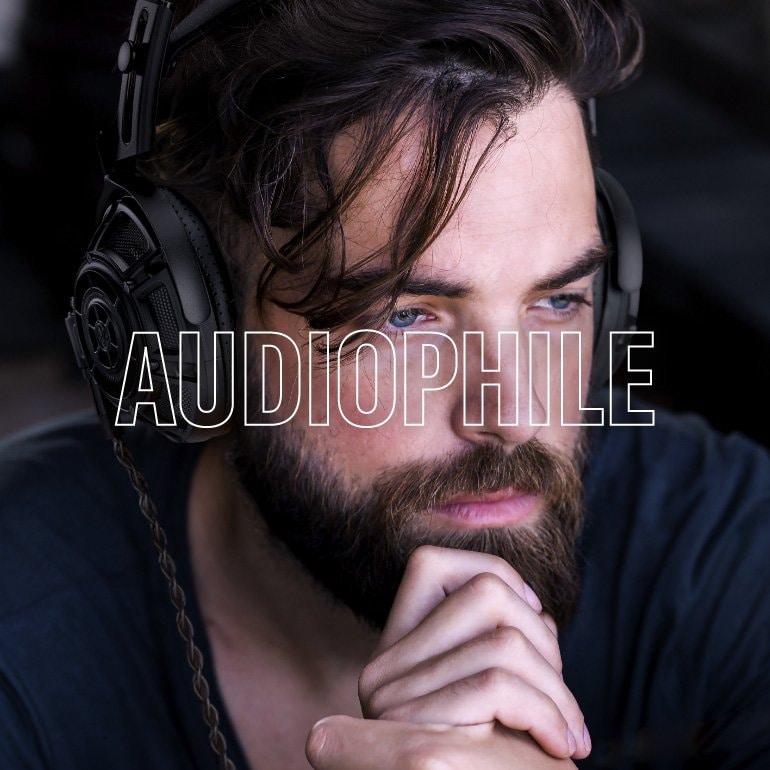 Lifestyle image showing a man wearing Yamaha YH-5000SE black color headphones