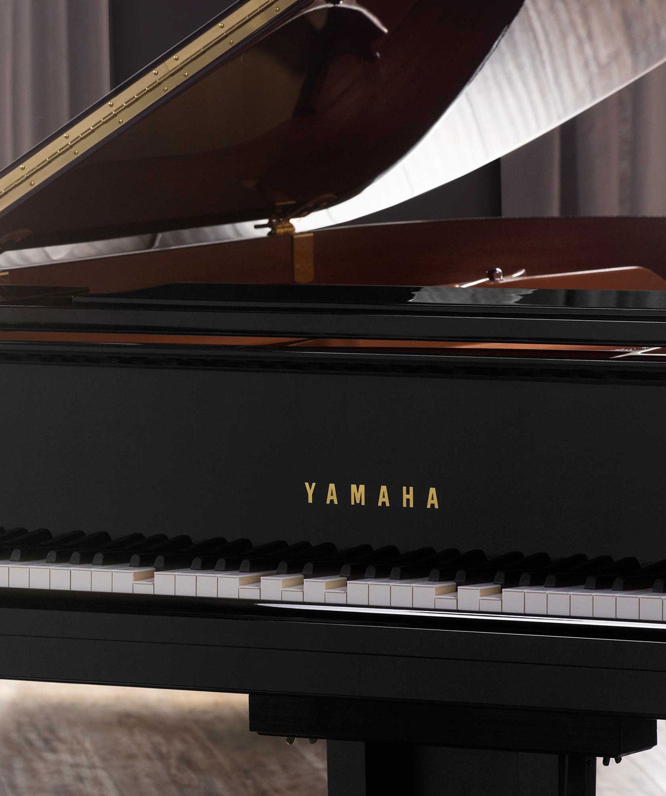 lifestyle image showing yamaha disklavier piano in a room