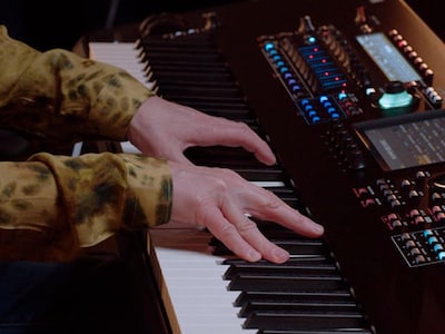 image of hands playing the yamaha montage m synthesizer