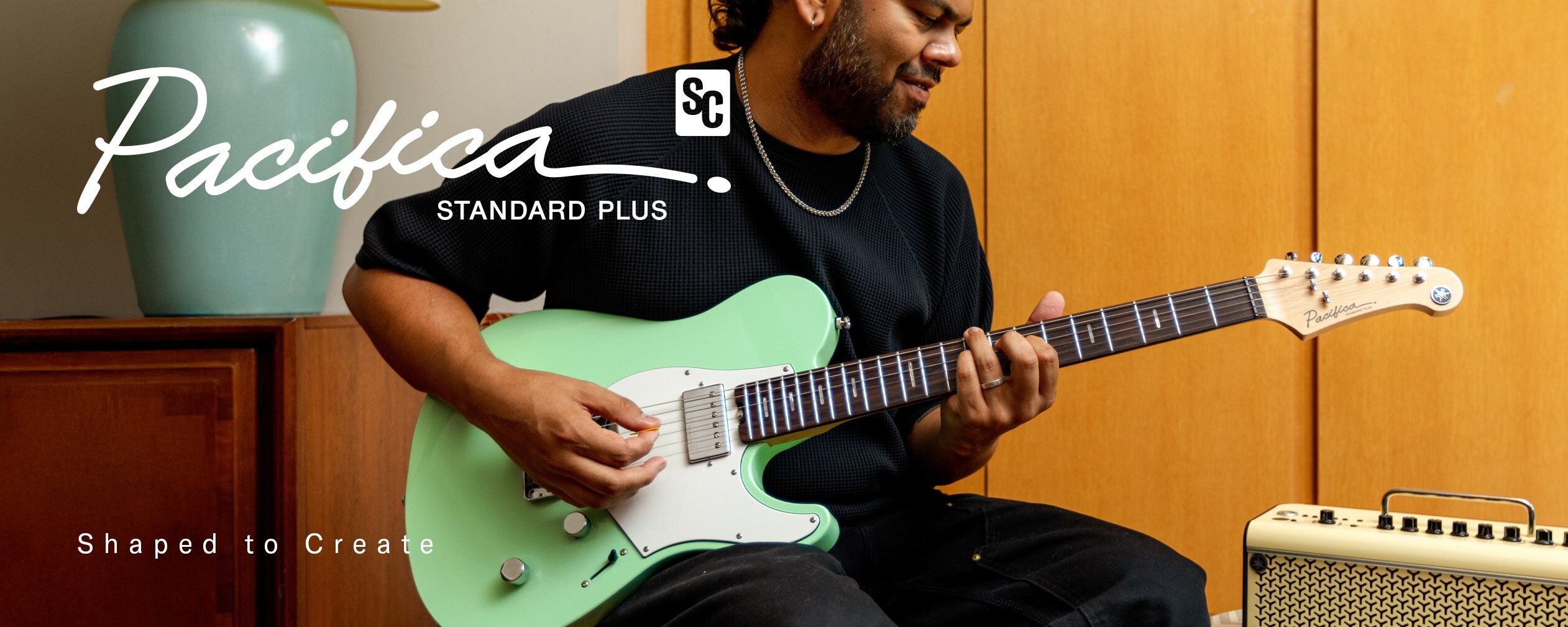A man playing Pacifica SC Standard Plus (PACS+11S PGN) at home using THR30II Wireless
