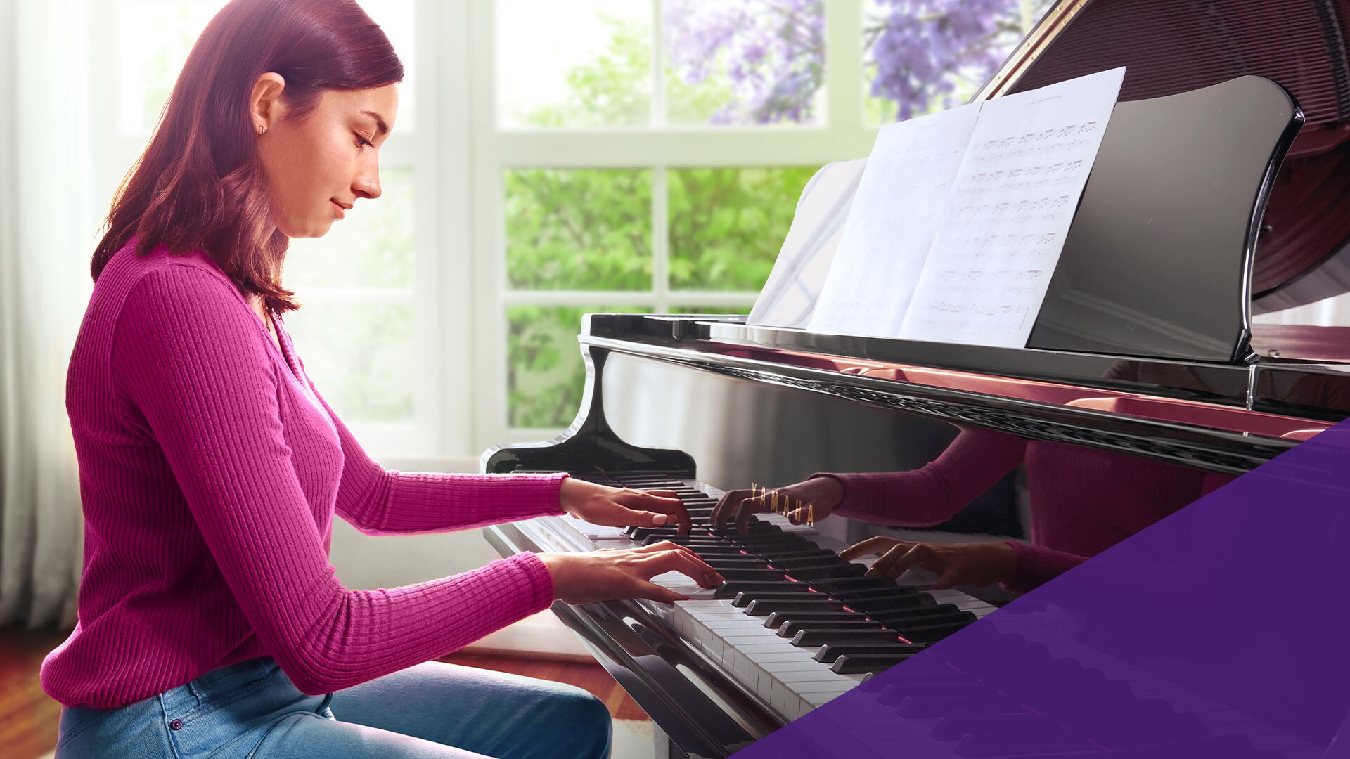 happy mother with daughter playing the piano 