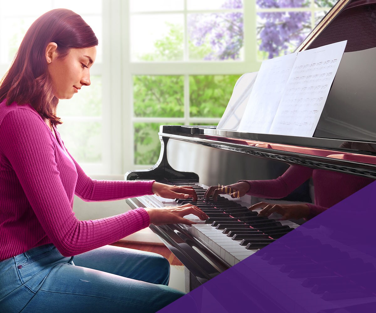 young lady playing the piano 