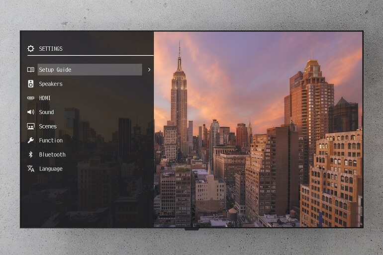 A TV with the RX500A on-screen settings menu open.