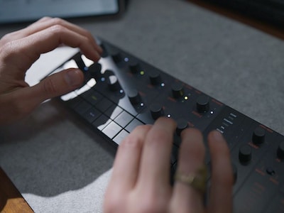 Closeup of person using the sequencer function.