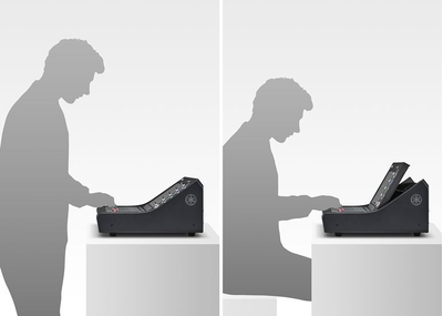 Tilt display for seated and standing operation