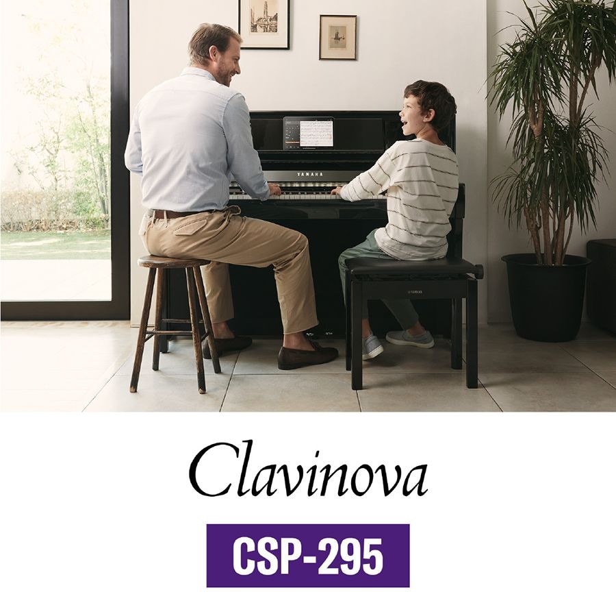 Man teaching kid on CSP-295 piano front view