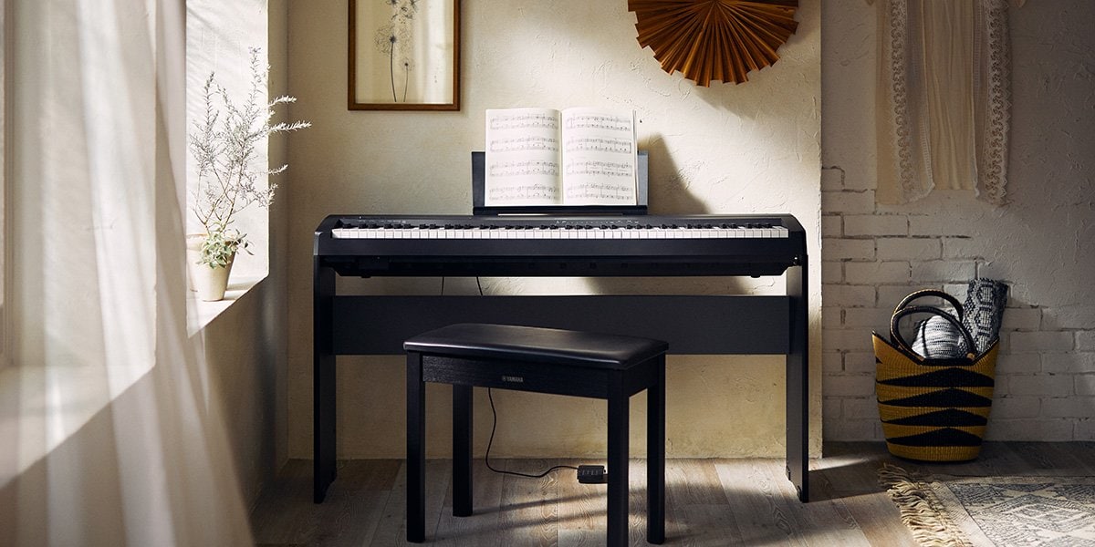 Front view of Lifestyle image of P-45 Piano in living room 