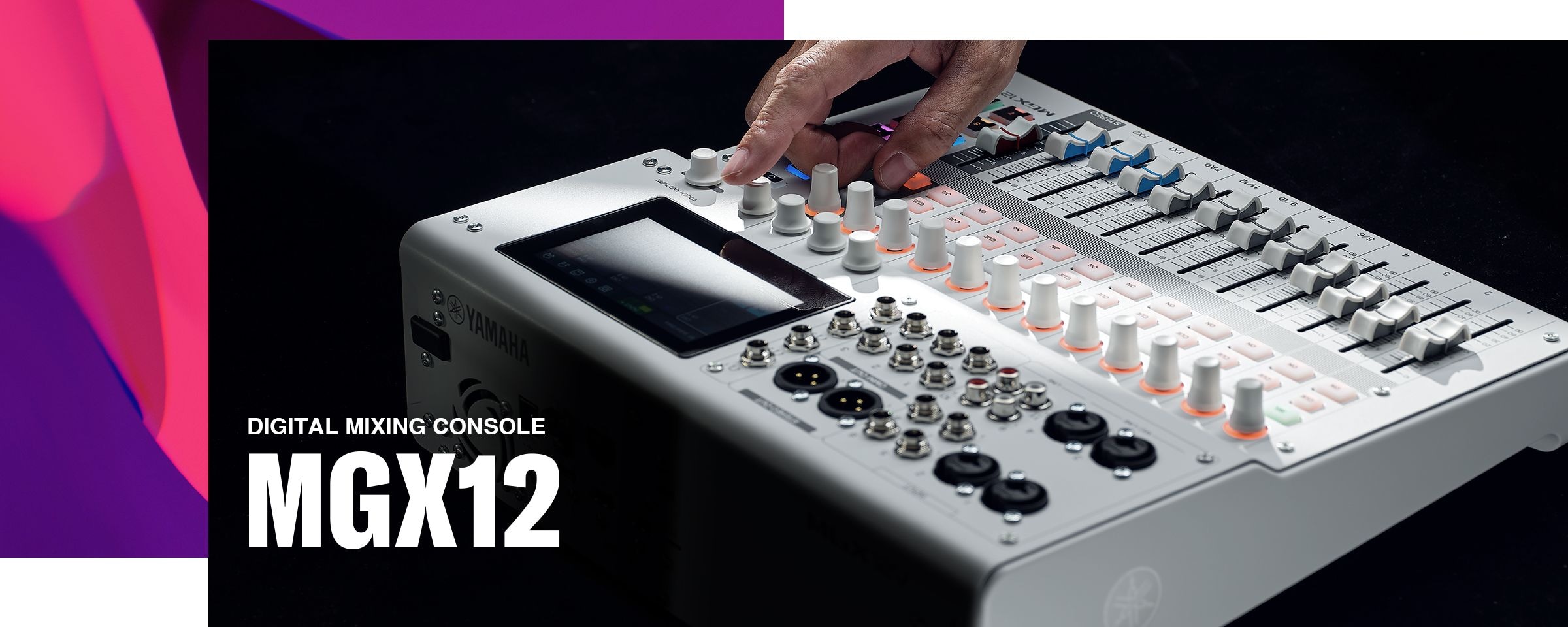 Hand dialing the knob of  Yamaha 18-Channel Digital Mixing Console MGX12