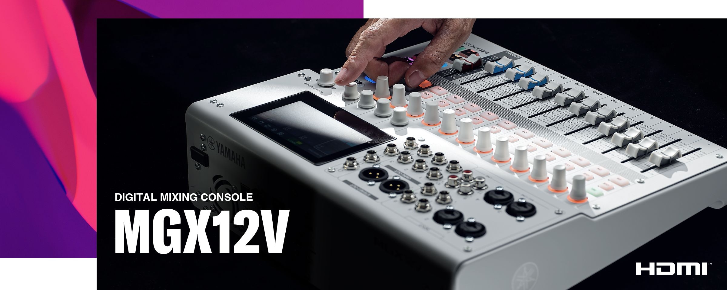 Hand controling the Yamaha 18-Channel Digital Mixing Console with Video Interface MGX12V