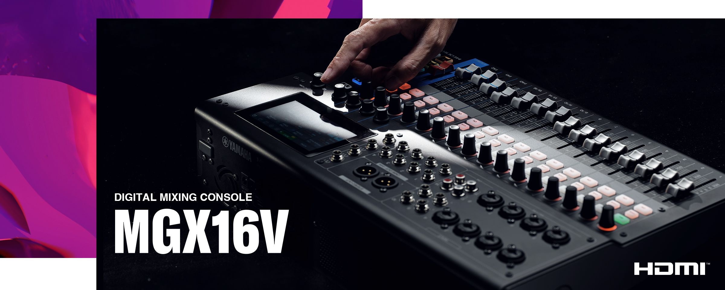 Hand taouching the knob of the Yamaha 22-Channel Digital Mixing Console with Video Interface MGX16V