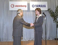 Shuji Ito (President of Yamaha Japan) and Patti Hart (Chairman CEO Pinnacle Systems)