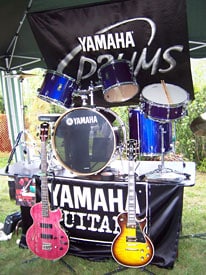 Yamaha Drumset and Guitars on display