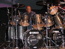 Billy Cobham plays the drums