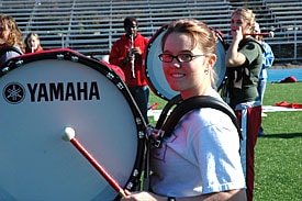 Woman Carrying Yamaha Bass Drum