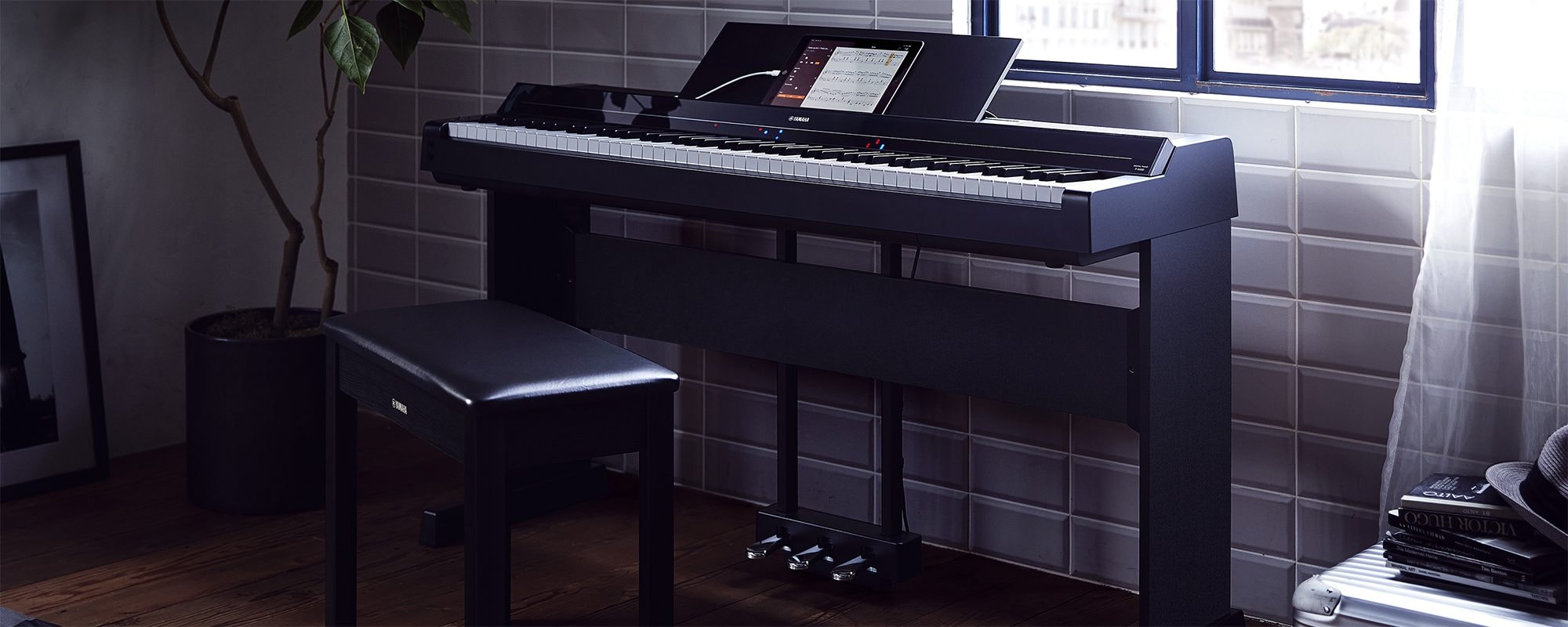 A Yamaha P-S500 Portable Digital Smart Piano in a room