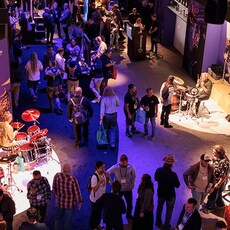 people gathering at NAMM show 