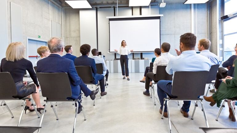 Photo showing a woman giving a presentation