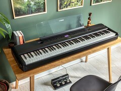 lifestyle image of yamaha P-525 Portable Piano with FC35 foot pedal