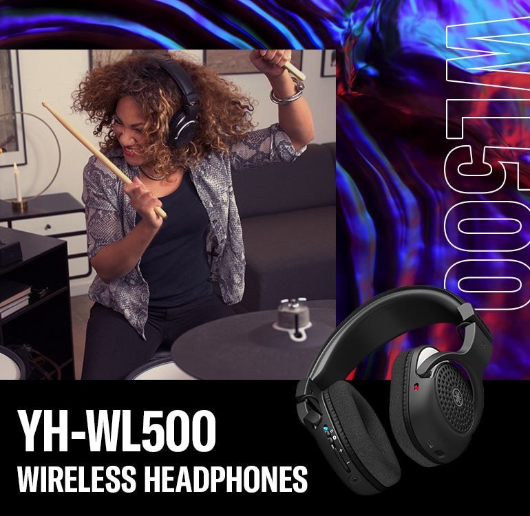 Bottom of YH-WL500 headphones. Drummer wearing YH-WL500 in a home setting while playing drums - Mobile