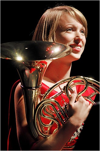 Close-up of Leelanee Sterrett playing French Horn